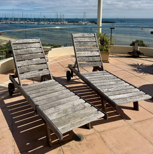 Two Teak Chaises